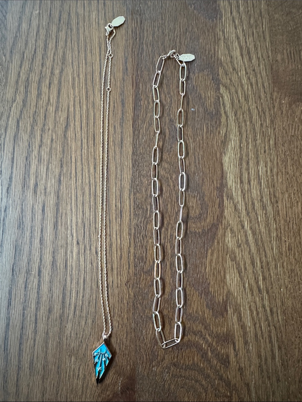 Two Elizabeth Stone necklaces. One gold and turquoise, one gold chain.